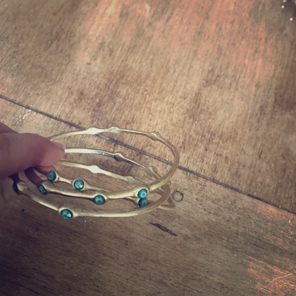 Three bangle bracelets with turquoise beads